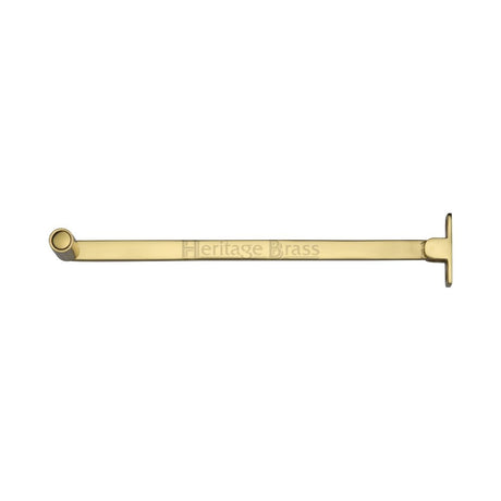 This is an image of a Heritage Brass - Roller Arm Stay 254mm Polished Brass Finish, v1119-10-pb that is available to order from Trade Door Handles in Kendal.