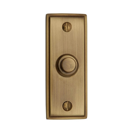 This is an image of a Heritage Brass - Bell Push 3" x 1" Antique Brass Finish, v1180-at that is available to order from Trade Door Handles in Kendal.