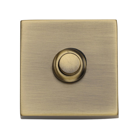 This is an image of a Heritage Brass - Square Bell Push Antique Brass finish, v1188-at that is available to order from Trade Door Handles in Kendal.