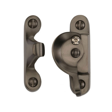 This is an image of a Heritage Brass - Fitch Pattern Sash Fastener Lockable Matt Bronze Finish, v2060l-mb that is available to order from Trade Door Handles in Kendal.