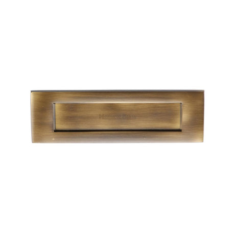 This is an image of a Heritage Brass - Letterplate 10" x 3" Antique Brass Finish, v850-254-at that is available to order from Trade Door Handles in Kendal.