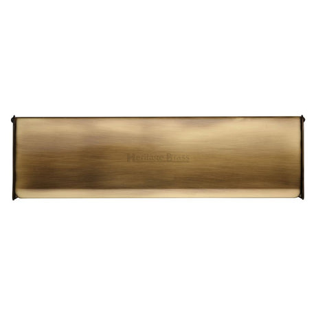 This is an image of a Heritage Brass - Interior Letterflap 11 3/4" x 3 1/2"Antique Brass Finish, v860-299-at that is available to order from Trade Door Handles in Kendal.