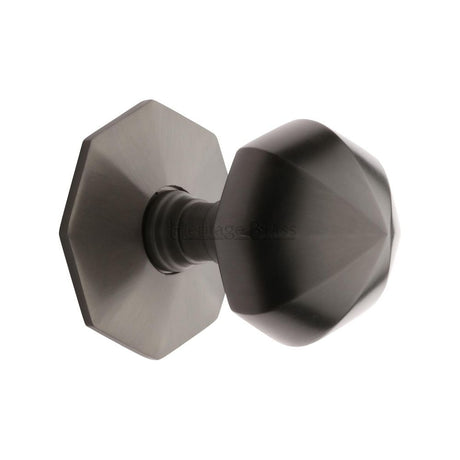 This is an image of a Heritage Brass - Octagon Centre Door Knob 2 1/2" Matt Bronze Finish, v880-mb that is available to order from Trade Door Handles in Kendal.