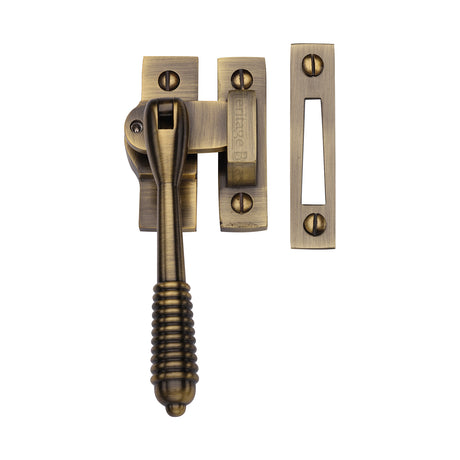 This is an image of a Heritage Brass - Lockable Mortice &amp; Hook Plate Casement Fastener Reeded Design Antique Brass finish, v894l-mp-hp-at that is available to order from Trade Door Handles in Kendal.