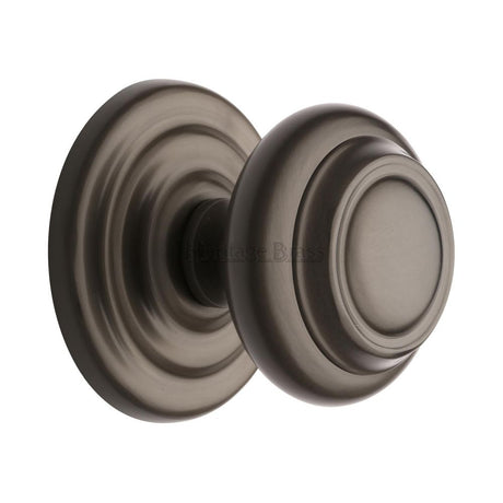 This is an image of a Heritage Brass - Centre Door Knob Round Design 3 1/2" Matt Bronze Finish, v905-mb that is available to order from Trade Door Handles in Kendal.