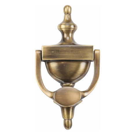 This is an image of a Heritage Brass - Urn Knocker 7 1/4" Antique Brass Finish, v910-195-at that is available to order from Trade Door Handles in Kendal.