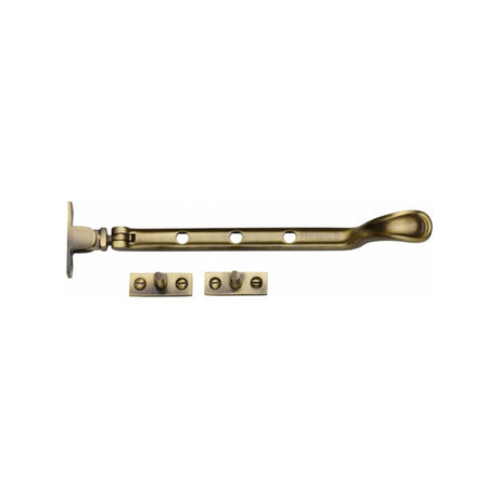 This is an image of a Heritage Brass - Casement Window Stay Spoon Pattern 8" Antique Brass Finish, v990-8-at that is available to order from Trade Door Handles in Kendal.