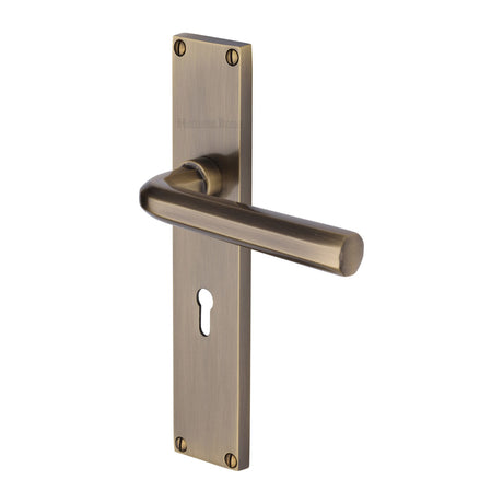 This is an image of a Heritage Brass - Octave Lever Lock Door Handle on 200mm Plate Antique Brass finish, vt5900-at that is available to order from Trade Door Handles in Kendal.