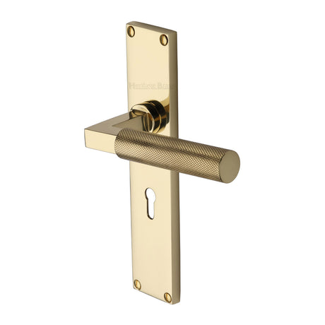 This is an image of a Heritage Brass - Bauhaus Knurled Lever Lock Door Handle on 200mm Plate Polished Brass finish, vt9300-pb that is available to order from Trade Door Handles in Kendal.