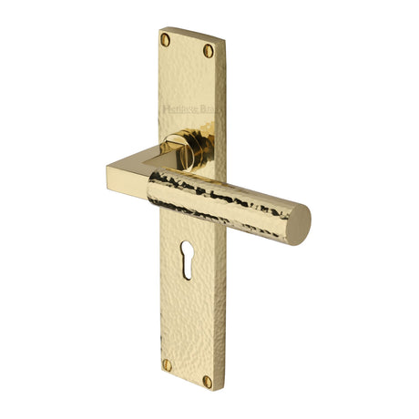 This is an image of a Heritage Brass - Bauhaus Hammered Lever Lock Door Handle on 200mm Plate Polished Brass finish, vth4300-pb that is available to order from Trade Door Handles in Kendal.