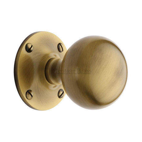 This is an image of a Heritage Brass - Mortice Knob Westminster Design Antique Brass Finish, wes970-at that is available to order from Trade Door Handles in Kendal.