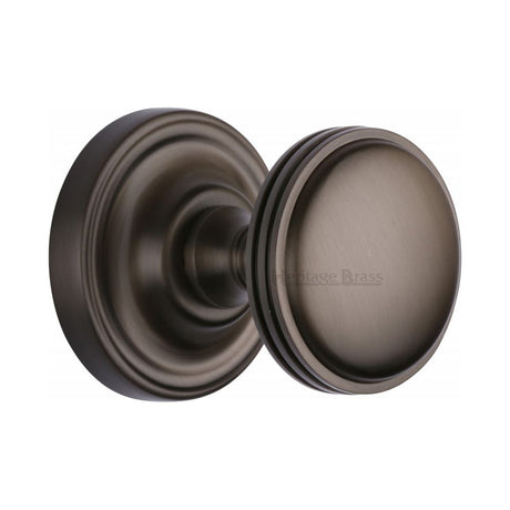 This is an image of a Heritage Brass - Mortice Knob on Rose Whitehall Design Matt Bronze Finish, whi6429-mb that is available to order from Trade Door Handles in Kendal.