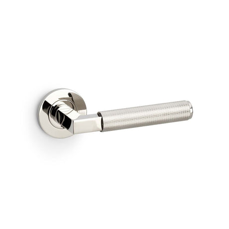 This is an image showing Alexander & Wilks Hurricane Knurled Lever on Round Rose - Polished Nickel PVD aw200pnpvd available to order from Trade Door Handles in Kendal, quick delivery and discounted prices.