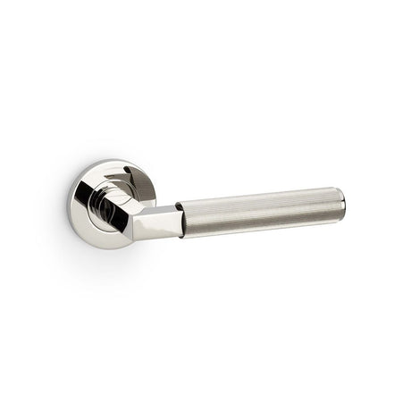 This is an image showing Alexander & Wilks Hurricane Reeded Lever on Round Rose - Polished Nickel PVD aw202pnpvd available to order from Trade Door Handles in Kendal, quick delivery and discounted prices.