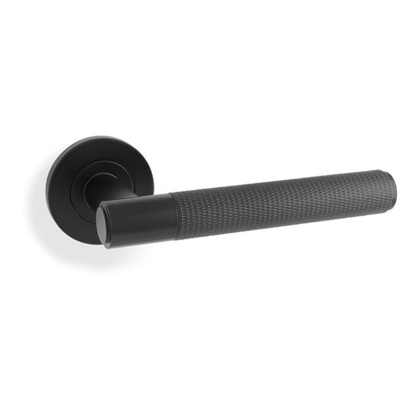 This is an image showing Alexander & Wilks Spitfire Knurled Lever on Round Rose - Black aw220bl available to order from Trade Door Handles in Kendal, quick delivery and discounted prices.