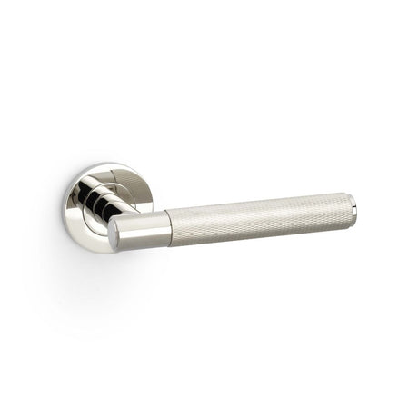 This is an image showing Alexander & Wilks Spitfire Knurled Lever on Round Rose - Polished Nickel PVD aw220pnpvd available to order from Trade Door Handles in Kendal, quick delivery and discounted prices.
