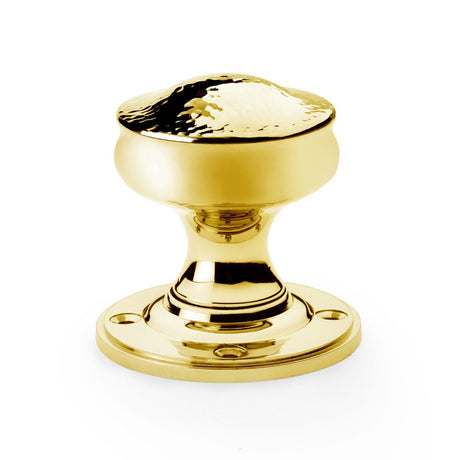 This is an image showing Alexander & Wilks Hammered Mortice Knob - Unlacquered Brass aw302-50-ub available to order from Trade Door Handles in Kendal, quick delivery and discounted prices.