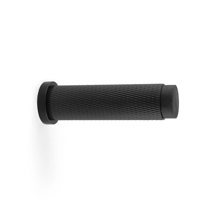 This is an image showing Alexander & Wilks Brunel Knurled Door Stop - Black aw600-75-bl available to order from Trade Door Handles in Kendal, quick delivery and discounted prices.