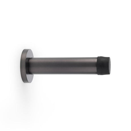 This is an image showing Alexander & Wilks Cylinder Projection Door Stop on Rose - Dark Bronze aw616dbz available to order from Trade Door Handles in Kendal, quick delivery and discounted prices.