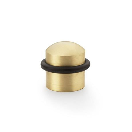 This is an image showing Alexander & Wilks Dome Top Floor Mounted Door Stop - Satin Brass aw638sb available to order from Trade Door Handles in Kendal, quick delivery and discounted prices.