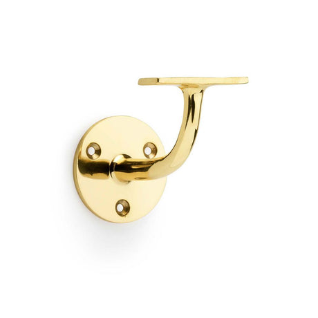 This is an image showing Alexander & Wilks Architectural Handrail Bracket - Polished Brass aw750pbl available to order from Trade Door Handles in Kendal, quick delivery and discounted prices.
