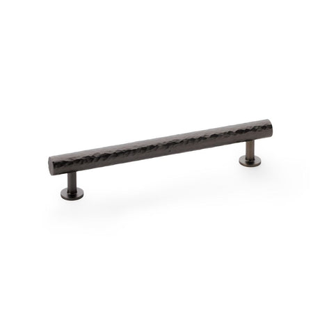 This is an image showing Alexander & Wilks Leila Hammered Cabinet Pull - Dark Bronze aw817-160-dbz available to order from Trade Door Handles in Kendal, quick delivery and discounted prices.