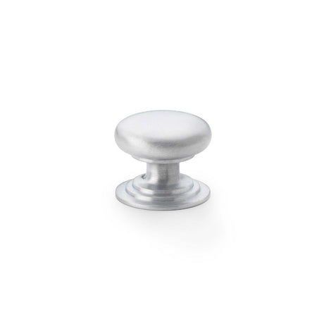 This is an image showing Alexander & Wilks Waltz Round Cupboard Knob on Stepped Rose - Satin Chrome - 32mm aw825-32-sc available to order from Trade Door Handles in Kendal, quick delivery and discounted prices.
