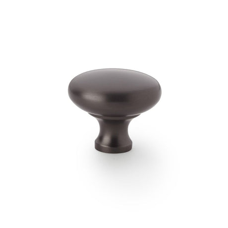 This is an image showing Alexander & Wilks Wade Round Cupboard Knob - Dark Bronze - 38mm aw836-38-dbz available to order from Trade Door Handles in Kendal, quick delivery and discounted prices.