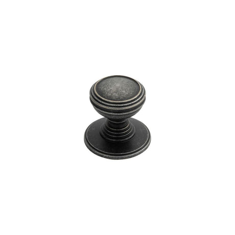 This is an image of a Delamain - Plain Knob 30mm - Pewter that is availble to order from Trade Door Handles in Kendal.