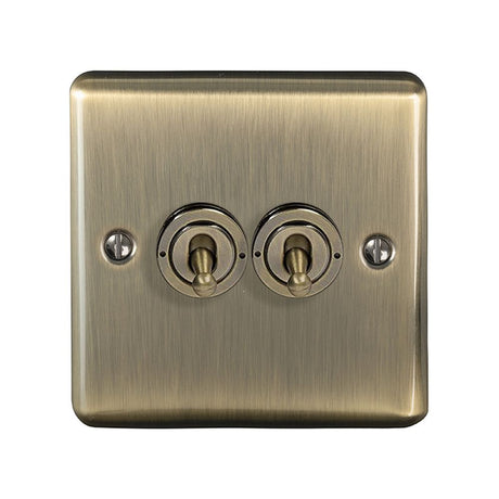 This is an image showing Eurolite Enhance Decorative 2 Gang Toggle Switch - Antique Brass (With Black Trim) ent2swabb available to order from trade door handles, quick delivery and discounted prices.