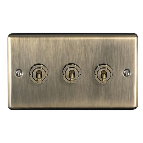 This is an image showing Eurolite Enhance Decorative 3 Gang Toggle Switch - Antique Brass (With Black Trim) ent3swabb available to order from trade door handles, quick delivery and discounted prices.