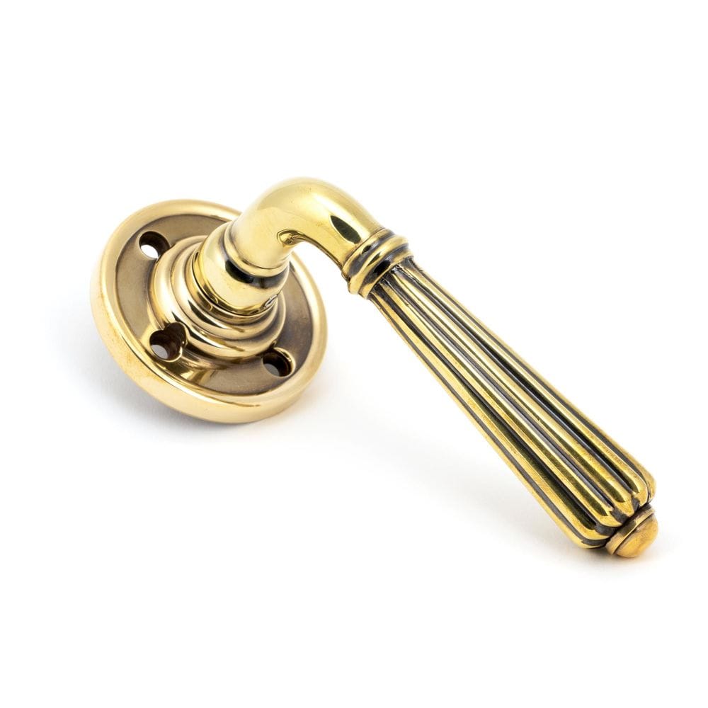 From The Anvil Door Furniture Aged Brass / Round Rose From The Anvil - Aged Brass Hinton Lever on Rose Set
