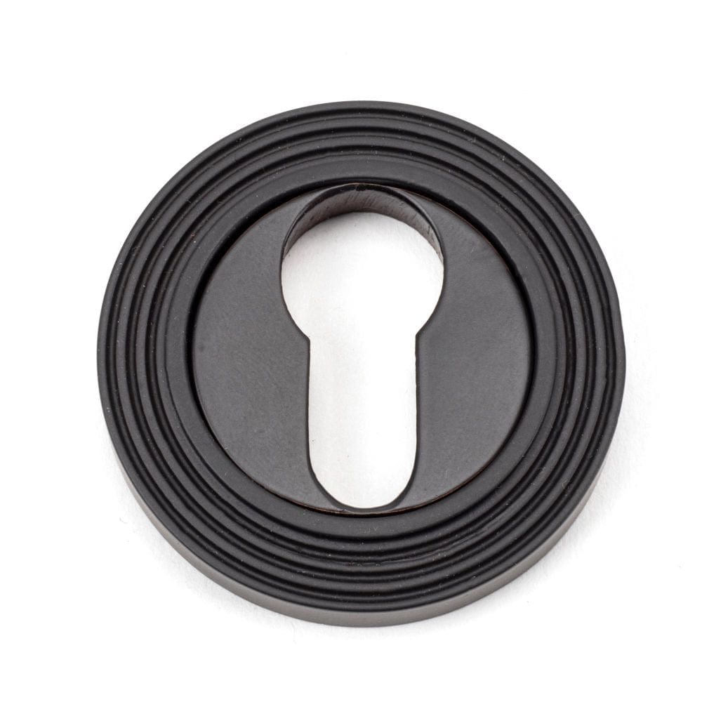 From The Anvil Door Furniture Aged Bronze / Euro Profile Escutcheons From The Anvil - Aged Bronze Round Euro Escutcheon (Beehive)