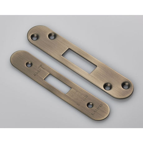 This is an image of a Eurospec - Forend Strike & Fixing Pack to suit Architectural Deadlocks (EDS/LDS) that is availble to order from Trade Door Handles in Kendal.