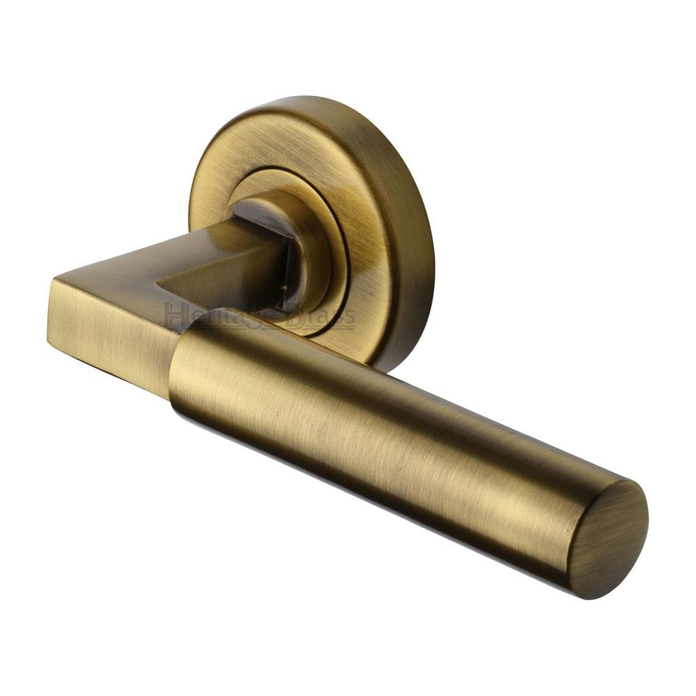 Heritage Brass Door Furniture Antique Brass / Round Rose Heritage Brass - Door Handle Lever on Rose Bauhaus Design Antique Brass Finish