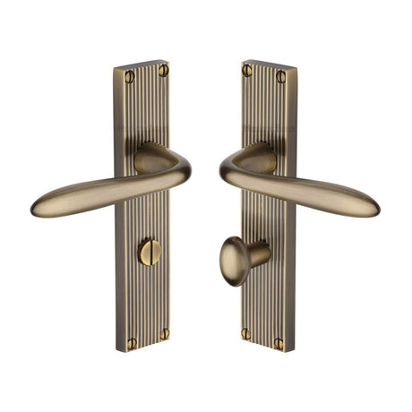 Heritage Brass Door Furniture Antique Brass / Bathroom Lock Handles Heritage Brass - Sutton Reeded Bathroom set Antique Brass finish