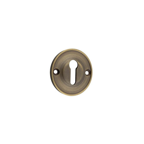 This is an image of a Burlington - 40mm AB Std keyway escutcheon   that is availble to order from Trade Door Handles in Kendal.