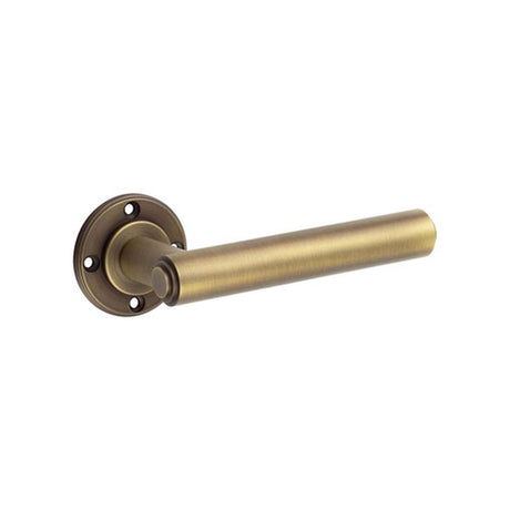 This is an image of a Burlington - Richmond Antique Brass Lever on Rose Door Handle - Roses Sold Separ  that is availble to order from Trade Door Handles in Kendal.
