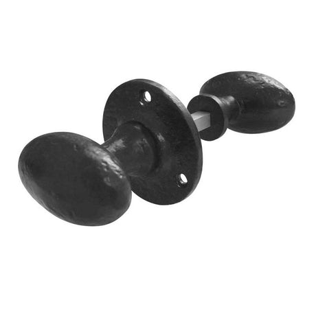 This is an image of a Frelan - Oval Shape Rim Knobs - Antique Black  that is availble to order from Trade Door Handles in Kendal.