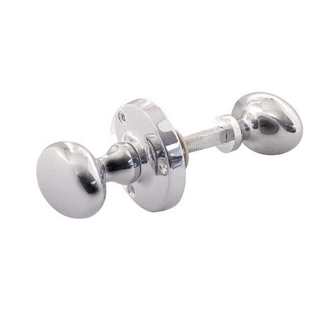 This is an image of a Frelan - Oval Unsprung Rim Knobs - Polished Chrome  that is availble to order from Trade Door Handles in Kendal.