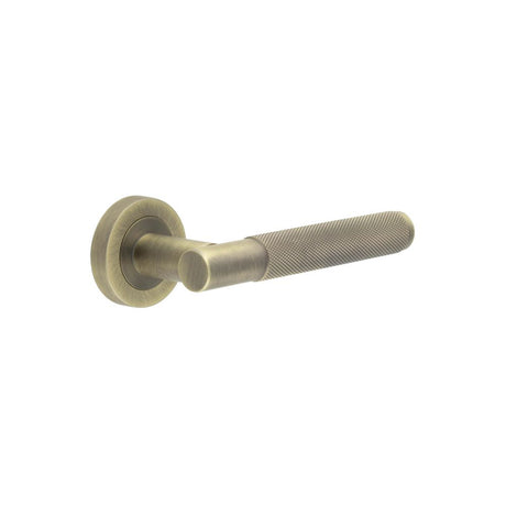 This is an image of a Frelan - Bari AB T Bar Knurled Lever on Rose  that is availble to order from Trade Door Handles in Kendal.