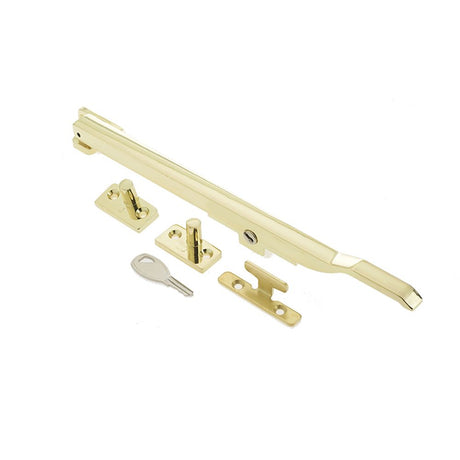 This is an image of a Frelan - Modern 250mm Lockable Casement Stay - Polished Brass  that is availble to order from Trade Door Handles in Kendal.