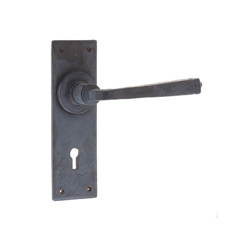 This is an image of a Frelan - Valley Forge Standard Lever Lock Handles on Backplate - Beeswax  that is availble to order from Trade Door Handles in Kendal.