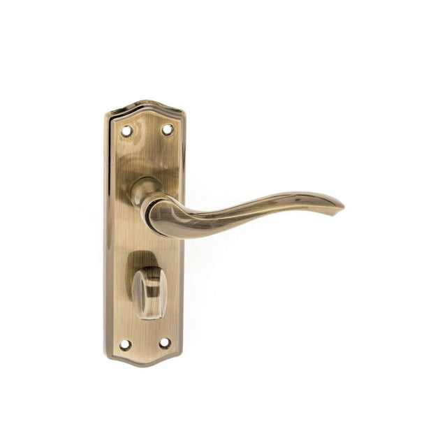 Old English Door Furniture Antique Brass / Bathroom Lock Handles Old English Warwick WC Lever on Backplate - Antique Brass