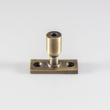 This is an image of a Carlisle Brass - Locking Casement Stay Pin - Florentine Bronze that is availble to order from Trade Door Handles in Kendal.
