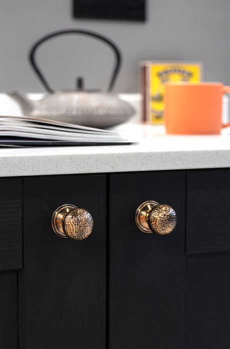 Image showing hammered cabinet knobs made by From the Anvil