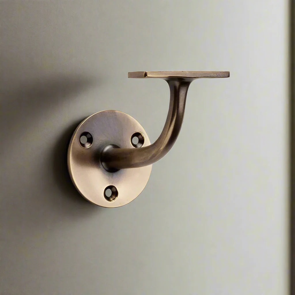 Alexander & Wilks Architectural Handrail Bracket - Antique Brass
