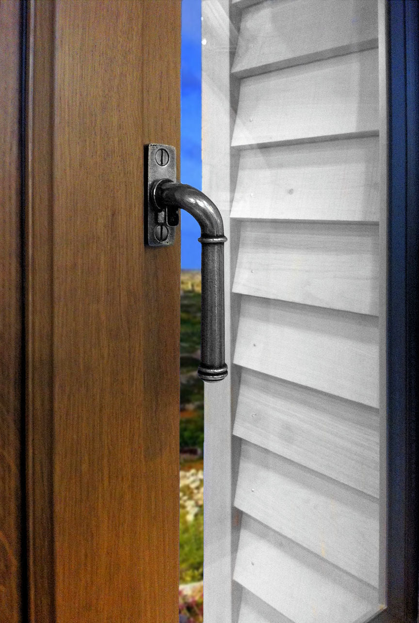 Image showing a Espagnolette window fastener made from solid pewter.  Available to order from Trade Door Handles in Kendal
