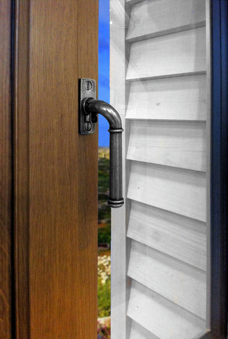 Image showing a Espagnolette window fastener made from solid pewter.  Available to order from Trade Door Handles in Kendal