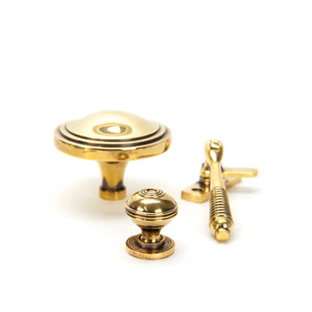 Image showing a collection of From The Anvil Aged Brass Ironmongery and Hardware.  Available to order from Trade Door Handles in Kendal.